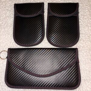 Three carbon fiber pouches w/keychains for Car registration, papers, etc. nwt